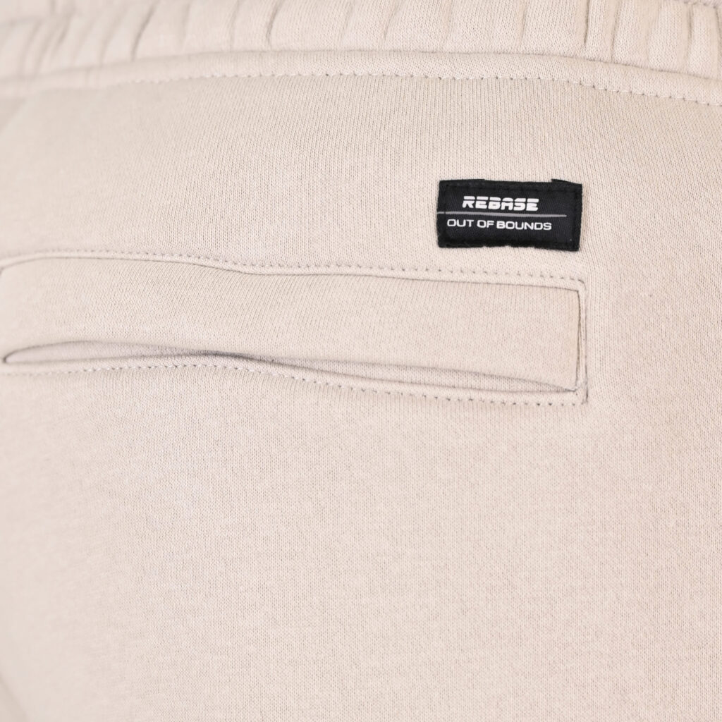 262RPAN-6046 JOGGER PANTS WITH ELASTIC WAISTBAND. HEM. HIGH DENSITY PRINT AND ZIPPERED POCKETS (BRUSHED FLEECE) ICE