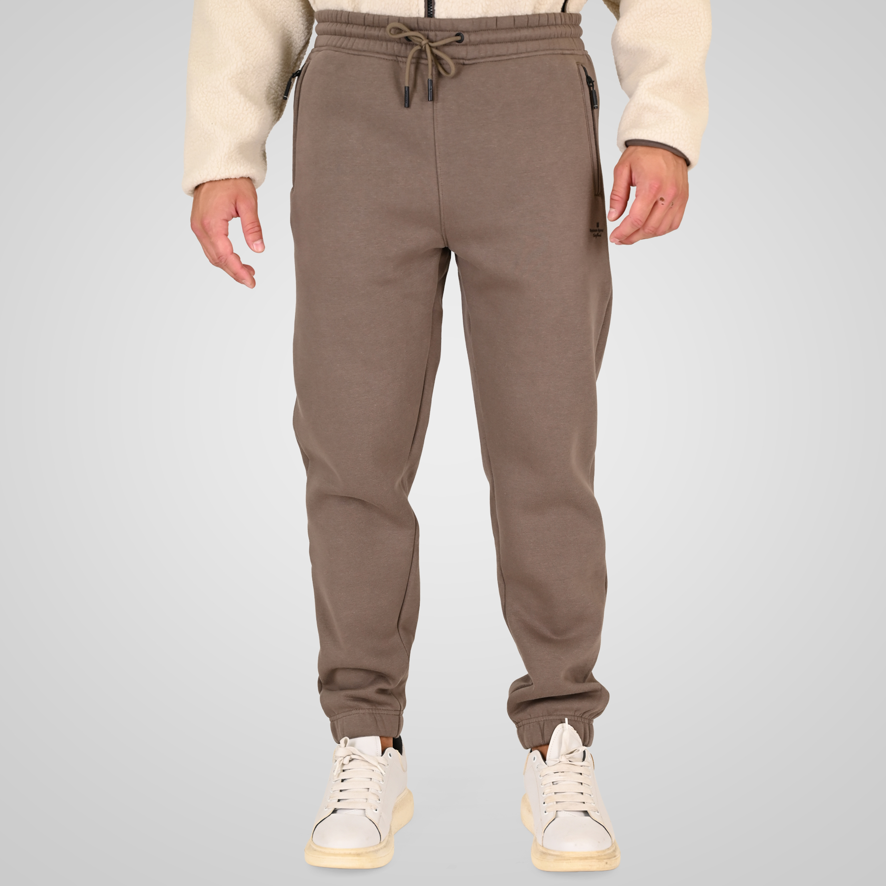 262RPAN-6046 JOGGER PANTS WITH ELASTIC WAISTBAND. HEM. HIGH DENSITY PRINT AND ZIPPERED POCKETS (BRUSHED FLEECE) TAUPE - Image 1